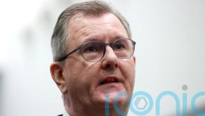 Donaldson says he will not ‘bow to threats’ amid warning of loyalist protests