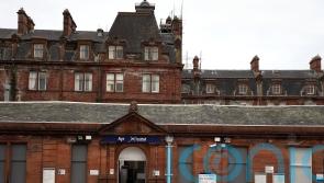 ‘No visible fire’ at hotel as crews revisit site