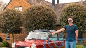 Simon Cowell takes delivery of classic electric Mini