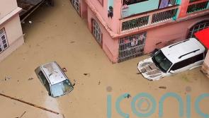 Flash floods kill at least 31 in northeastern India and leave nearly 100 missing