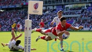 Louis Rees-Zammit claims hat-trick of tries as Wales comfortably top group