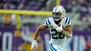 Jonathan Taylor ends speculation over his future by committing to the Colts