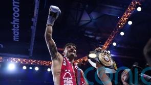 Leigh Wood stops Josh Warrington in seventh round to retain featherweight crown