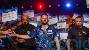 Luke Humphries beats Gerwyn Price to claim first major title at World Grand Prix