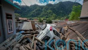 Indian rescue helicopters fly to Himalayan area where floods killed at least 52