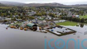 Flood warnings remain in place as rain eases