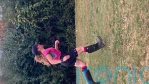 Runner sets blistering new record for running half marathon in wellies