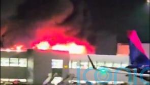 Firefighters taken to hospital after fire at Luton Airport