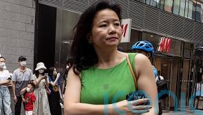 Journalist detained in China for three years returns to Australia