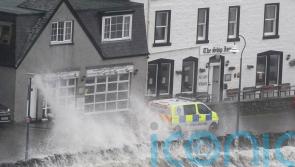Woman dies after being swept into river during Storm Babet weather warning