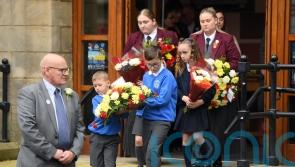 Shankill Road falls silent to remember one of the darkest days of the Troubles