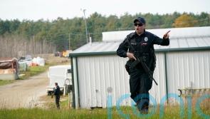 Maine police searching for gunman check possible suicide note