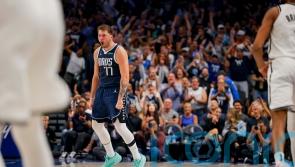 Luka Doncic scores 49 with four straight three-pointers to beat Brooklyn