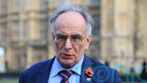Minister pictured campaigning with suspended former Tory MP Peter Bone