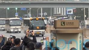 Hundreds gather to pay tribute as former Chinese premier is laid to rest