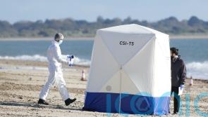 Man whose body was found on beach has been identified, police say