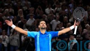 Novak Djokovic overcomes booing crowd to beat Holger Rune at Paris Masters