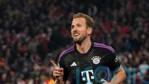 Harry Kane sends Bayern Munich into the Champions League knockout stages