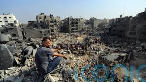 Thousands queue to leave Gaza City as Israel agrees to daily pause in offensive