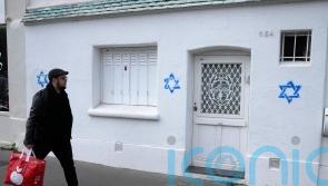 France blames Russia over bot campaign linked to antisemitic graffiti