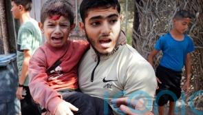 Israeli forces strike near hospitals as troops push further into Gaza