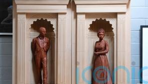 King unveils statues of late Queen and Prince Philip at Royal Albert Hall
