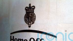 Asylum backlog of older cases down by nearly half since July