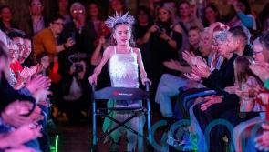 Girl with muscular dystrophy walks runway at Bristol Fashion Show