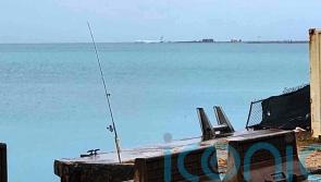 No injuries as US military plane overshoots runway and ends up in sea