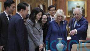 Palace lunch coincides with North Korea&rsquo;s attempt to launch spy satellite