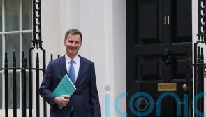 Hunt claims UK has ‘turned a corner’ as he slashes national insurance