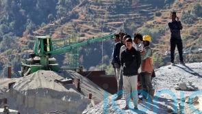Digging to rescue 41 workers trapped in tunnel in India hit by mechanical issue