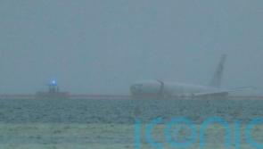 Flight data recorder recovered from US navy plane that overshot runway