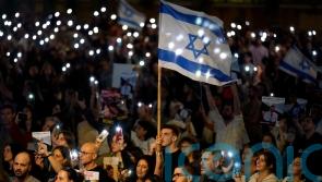Israeli military says 13 Israelis and four Thai nationals released in Gaza