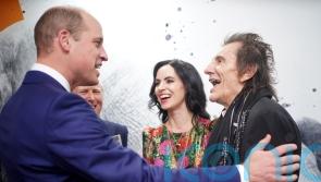 Ronnie Wood tempts William with Rolling Stones tour tickets at Tusk awards