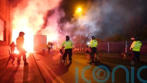 Police charge more than 40 away fans after major disorder outside Villa Park