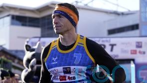Kevin Sinfield greeted by Sir Gareth Edwards after latest fundraising challenge
