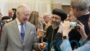 Charles given handwritten Christmas letter by six-year-old girl on church visit