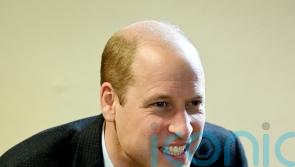 William surprises mother on charity walk in memory of daughter