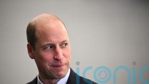 William serves food during homeless charity’s Christmas lunch