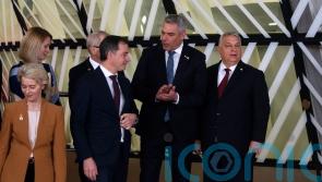 EU leaders at summit face challenge from Orban over promises to Ukraine