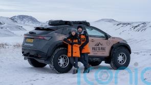 Couple finish 21,000-mile challenge to drive electric vehicle from pole to pole