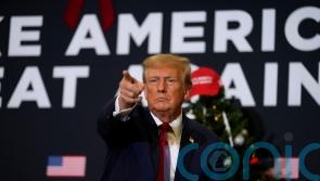 Trump defends comments about immigrants ‘poisoning the nation’s blood’