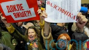 Serbia opposition urges EU to help open international probe into disputed vote