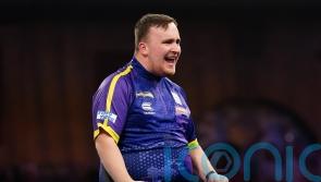 Luke Littler continues dream World Championship with victory over Andrew Gilding