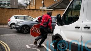 Second arrest after Banksy street art stop sign removed from pole