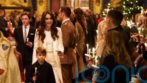 Kate meets teenager and his football coach at surprise Christmas tea party