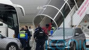 Plane lands in India after days grounded in France in human trafficking probe