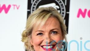 On cloud nine: BBC weather presenter Carol Kirkwood ties the knot