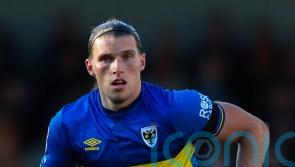 Wimbledon beat Colchester in eight-goal thriller